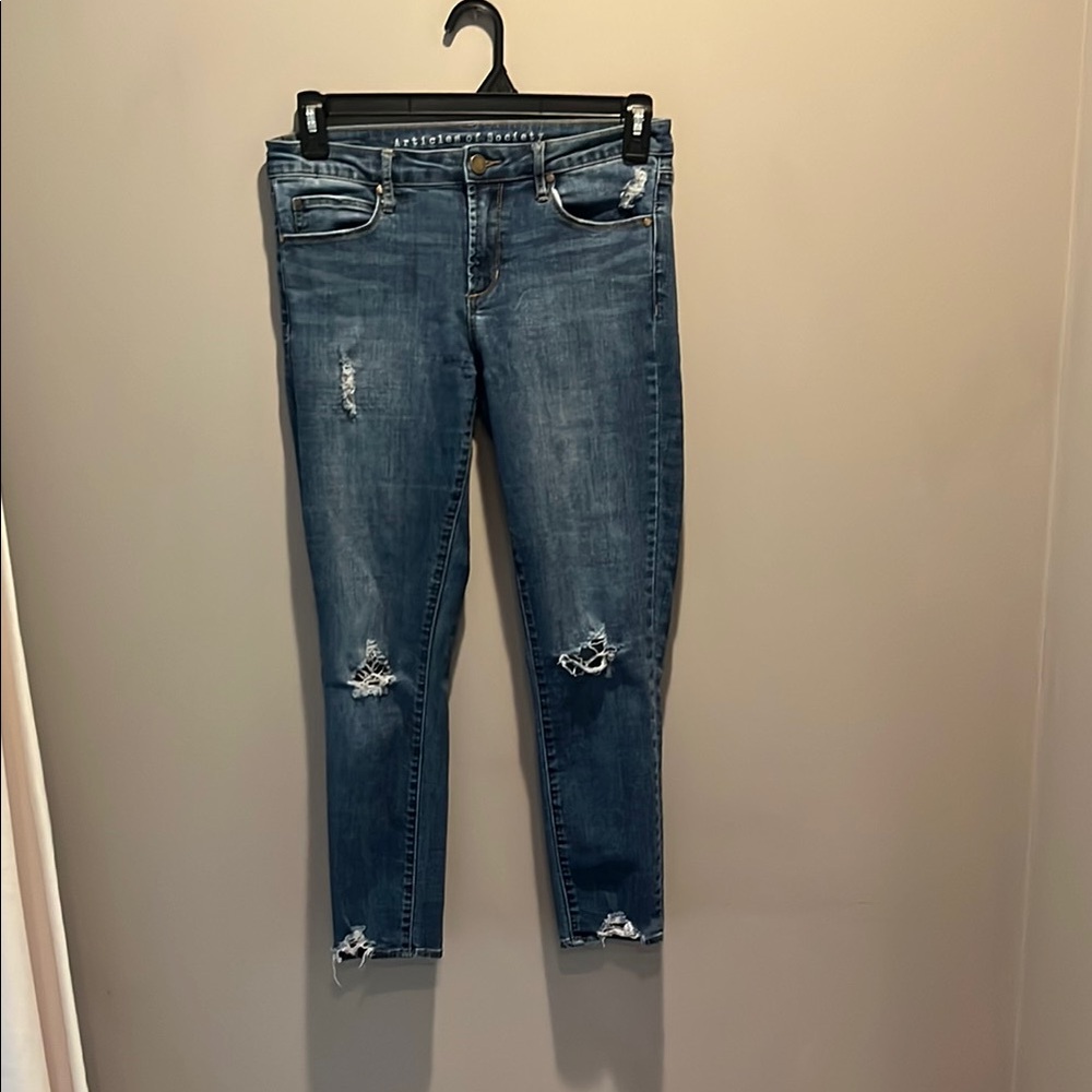 Distressed Blue Jeans